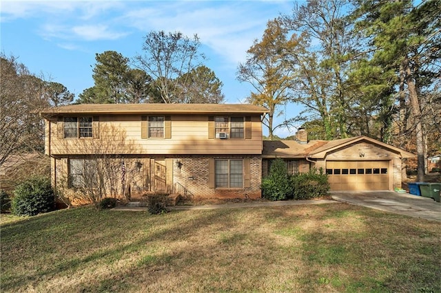 view of front of home with a garage and a front yard