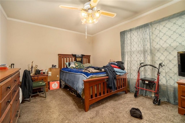 bedroom featuring ceiling fan, carpet, and crown molding