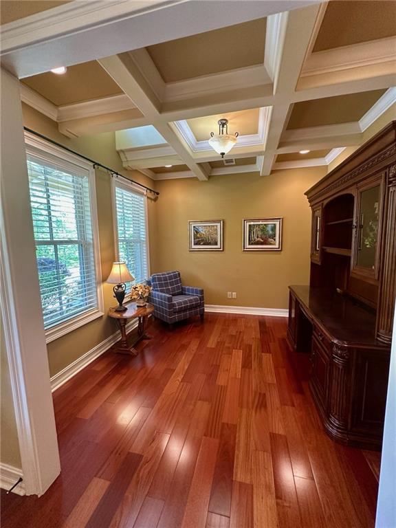 3397 Holly Glen Dr, Dacula, GA 30019 - sitting room featuring coffered ceiling, dark wood-style floors, and baseboards