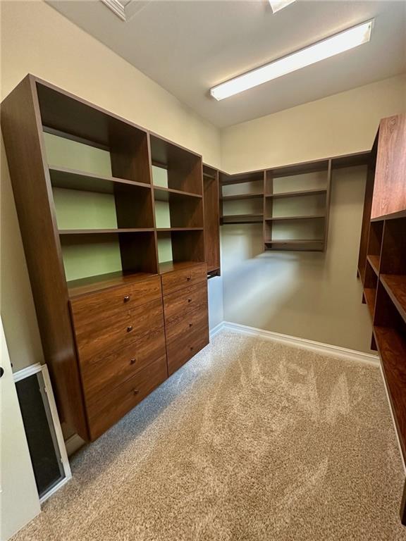 3397 Holly Glen Dr, Dacula, GA 30019 - walk in closet featuring carpet flooring