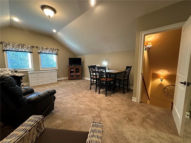 3397 Holly Glen Dr, Dacula, GA 30019 - living room with lofted ceiling, baseboards, and carpet floors