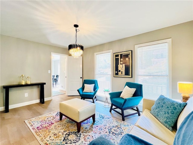 430 Thornbush Trce, Lawrenceville, GA 30046 - living area featuring a chandelier and wood finished floors