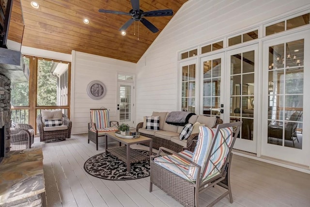 living room featuring ceiling fan, wood-type flooring, wood ceiling, and high vaulted ceiling