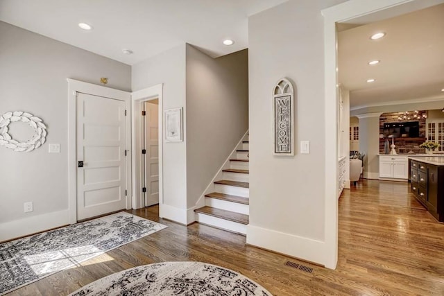 foyer featuring dark hardwood / wood-style floors