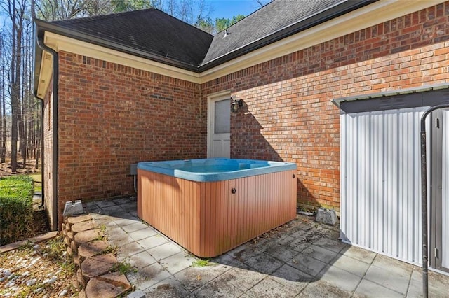 view of patio with a hot tub