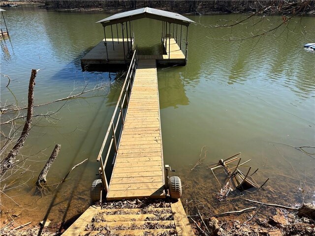 dock area with a water view