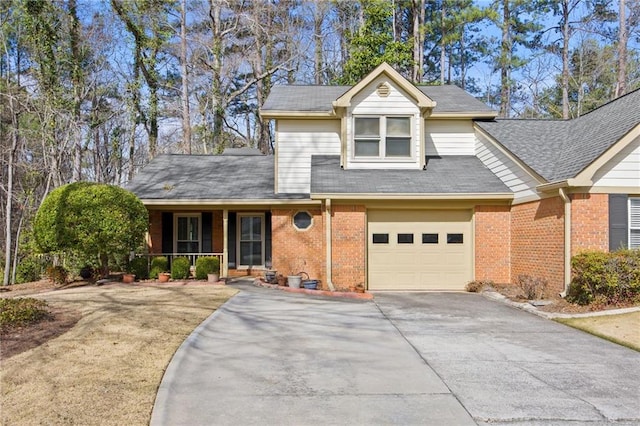 view of front of house with a porch and a garage