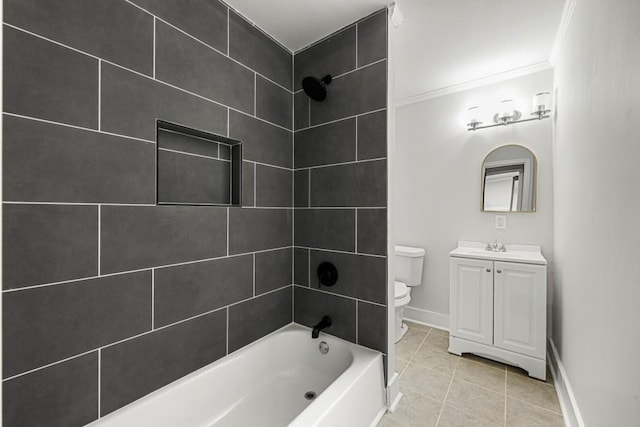 full bathroom with tiled shower / bath combo, tile patterned floors, crown molding, toilet, and vanity