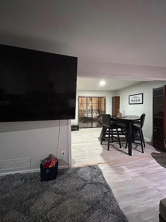 170 Beatrice St, Dallas, GA 30157 - dining room with baseboards and light wood finished floors