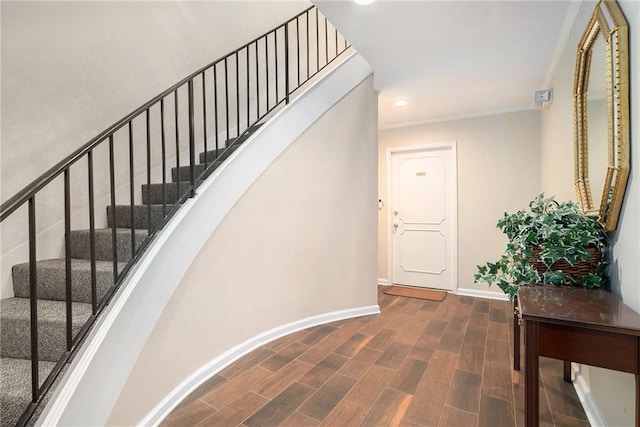 stairway with hardwood / wood-style flooring