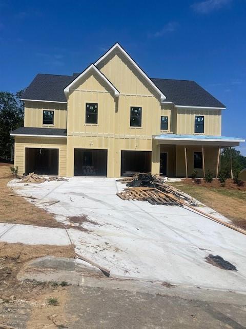 222 Silvercrest Dr, Acworth, GA 30101 - view of front facade with a garage and covered porch