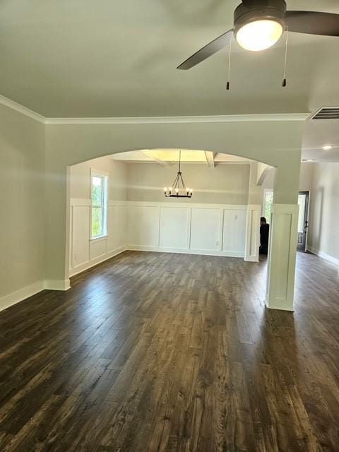 222 Silvercrest Dr, Acworth, GA 30101 - unfurnished living room with dark wood-type flooring, ceiling fan, crown molding, a chandelier, and baseboards
