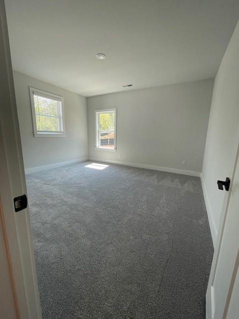 222 Silvercrest Dr, Acworth, GA 30101 - spare room with carpet floors and baseboards