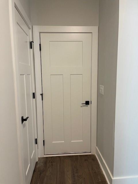 222 Silvercrest Dr, Acworth, GA 30101 - doorway with dark wood-type flooring and baseboards