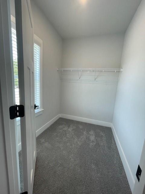222 Silvercrest Dr, Acworth, GA 30101 - walk in closet featuring dark colored carpet