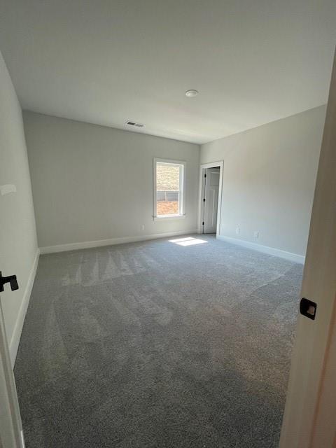 222 Silvercrest Dr, Acworth, GA 30101 - spare room with carpet and baseboards