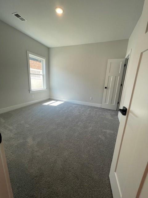 222 Silvercrest Dr, Acworth, GA 30101 - carpeted spare room with baseboards