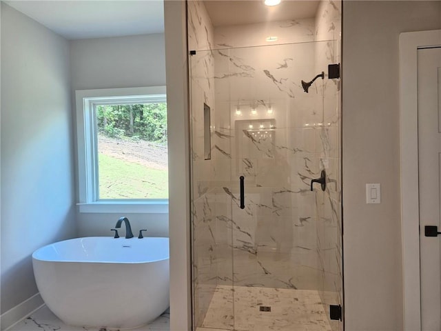 222 Silvercrest Dr, Acworth, GA 30101 - bathroom with a marble finish shower, a soaking tub, marble finish floors, and baseboards