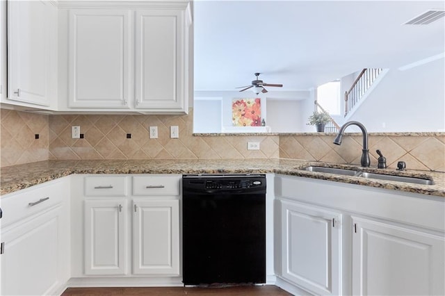 kitchen featuring white cabinets, ceiling fan, a sink, black dishwasher, and visible vents