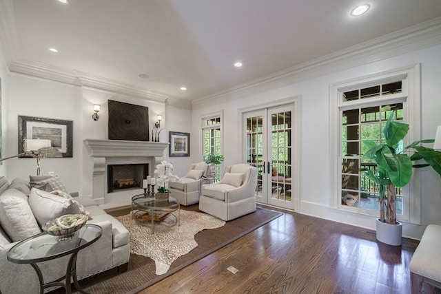 living room with crown molding, french doors, and hardwood / wood-style floors