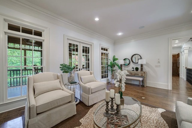 living room with french doors, dark wood-type flooring, and ornamental molding