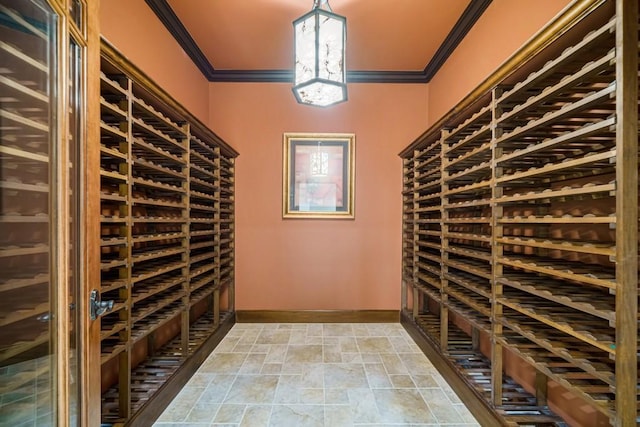 wine room with ornamental molding and light tile floors