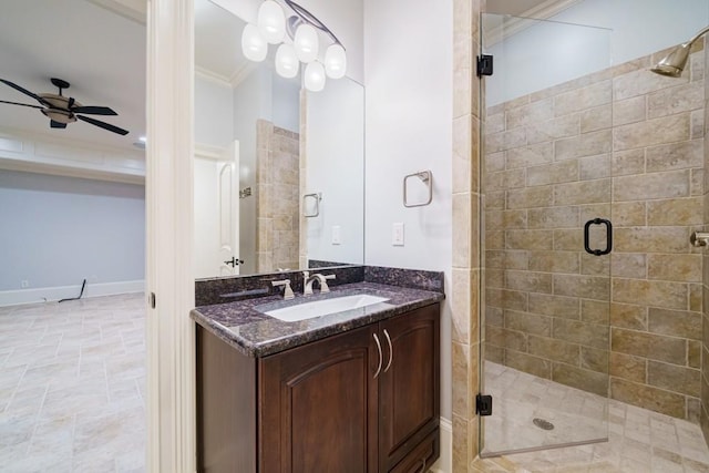 bathroom featuring tile flooring, a shower with shower door, ceiling fan, large vanity, and crown molding