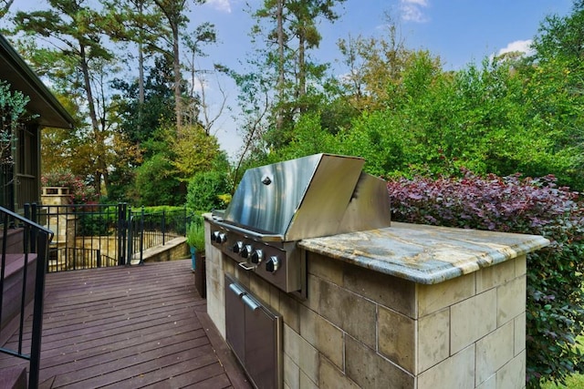 deck featuring area for grilling and grilling area