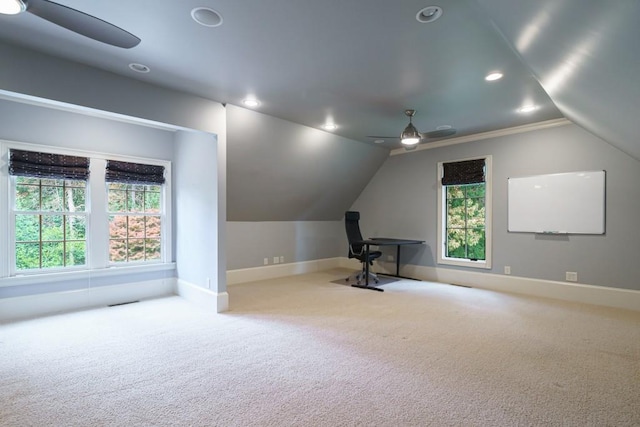 bonus room featuring light carpet, lofted ceiling, and ceiling fan