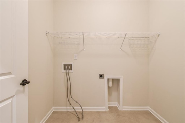 clothes washing area featuring washer hookup and hookup for an electric dryer