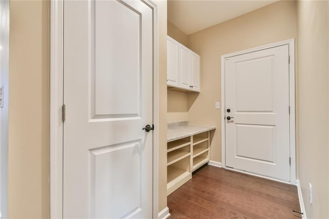 interior space with dark wood-type flooring