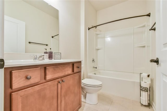 full bathroom featuring toilet, tile patterned flooring, vanity, and tub / shower combination