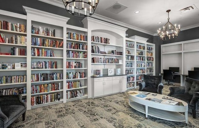 living area featuring ornamental molding and an inviting chandelier