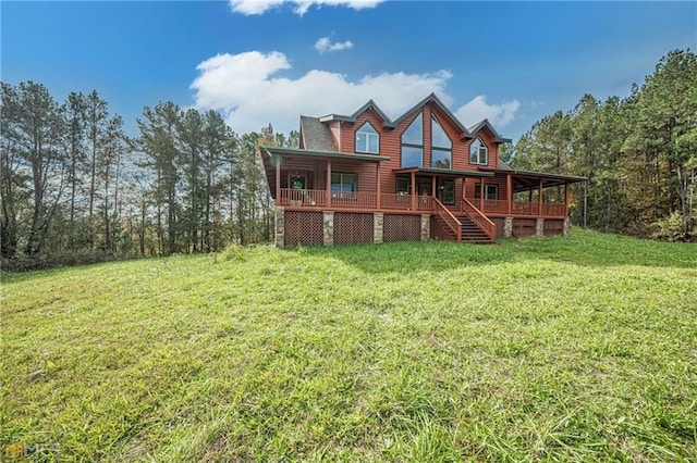 524 Bethany Church Rd SW, Crawfordville, GA 30631 - back of house featuring faux log siding and a lawn