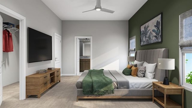 bedroom featuring ensuite bathroom, ceiling fan, light colored carpet, and a spacious closet