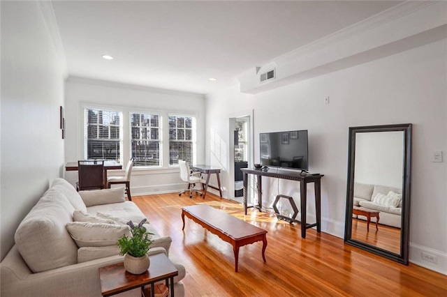 690 Piedmont Ave NE Unit 17, Atlanta, GA 30308 - living room featuring light wood-type flooring, ornamental molding, baseboards, and recessed lighting