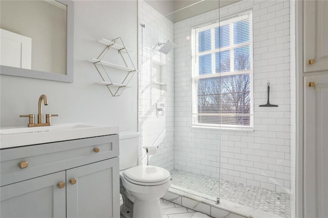 690 Piedmont Ave NE Unit 17, Atlanta, GA 30308 - full bath with a stall shower, toilet, and vanity