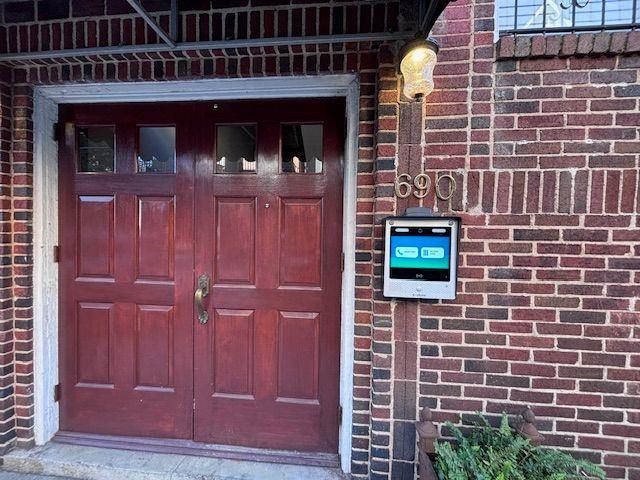 690 Piedmont Ave NE Unit 17, Atlanta, GA 30308 - doorway to property with brick siding