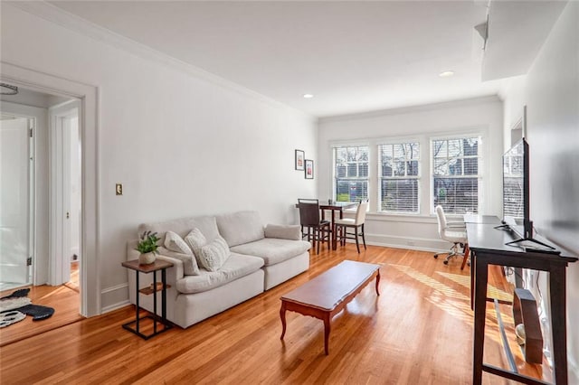 690 Piedmont Ave NE Unit 17, Atlanta, GA 30308 - living area with light wood-style flooring, baseboards, ornamental molding, and recessed lighting