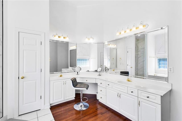 385 Windermere Cir, Newnan, GA 30265 - bathroom featuring vanity and wood finished floors
