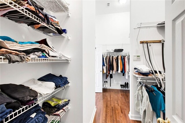 385 Windermere Cir, Newnan, GA 30265 - spacious closet with wood finished floors
