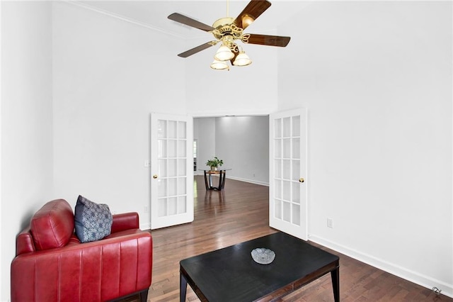 385 Windermere Cir, Newnan, GA 30265 - living room featuring french doors, baseboards, and a towering ceiling