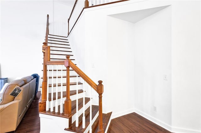 385 Windermere Cir, Newnan, GA 30265 - staircase with wood finished floors and baseboards