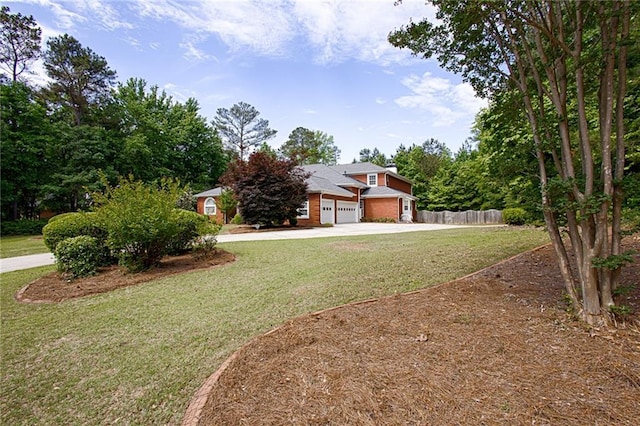 385 Windermere Cir, Newnan, GA 30265 - obstructed view of property featuring driveway and an attached garage