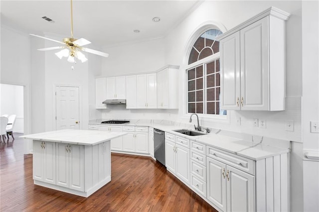 385 Windermere Cir, Newnan, GA 30265 - kitchen with a sink, black gas stovetop, dishwasher, under cabinet range hood, and white cabinets