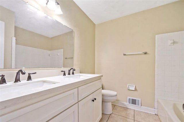full bathroom featuring toilet, tile patterned flooring, a sink, and visible vents
