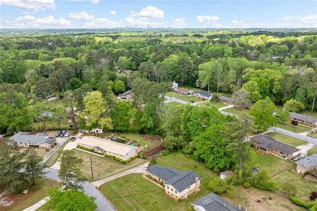 bird's eye view featuring a view of trees