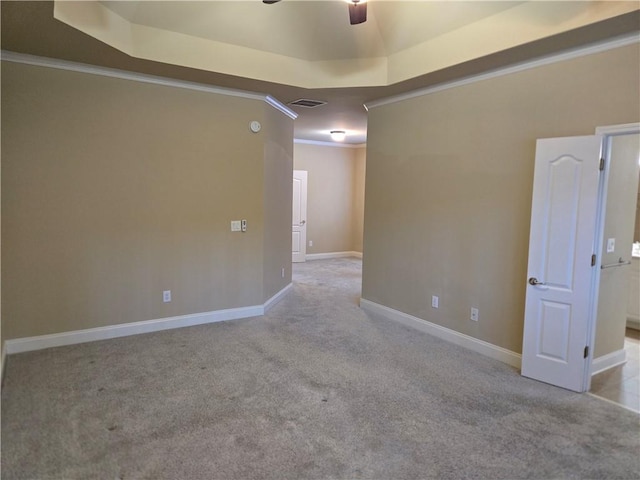 2110 Retreat Haven Ln, Dacula, GA 30019 - unfurnished room featuring carpet flooring, ornamental molding, ceiling fan, a tray ceiling, and baseboards