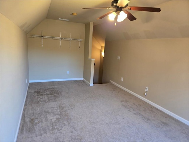 2110 Retreat Haven Ln, Dacula, GA 30019 - unfurnished bedroom featuring vaulted ceiling, carpet, a ceiling fan, and baseboards