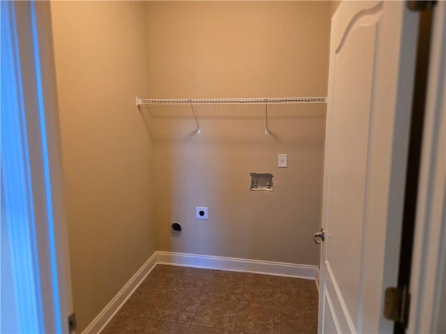 2110 Retreat Haven Ln, Dacula, GA 30019 - laundry room with hookup for an electric dryer, hookup for a washing machine, and baseboards
